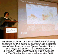 Ms Brenda Jones of the US Geological Survey speaking at the event concerning the practical use of the International Space Charter Space and Major Disasters. In the background a UNOSAT map illustrates how the benefits of the Charter become usable in the field.