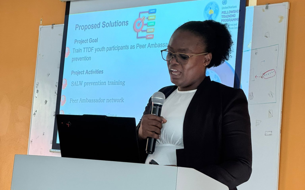 A participant delivers a presentation during the Fellowship Training Programme