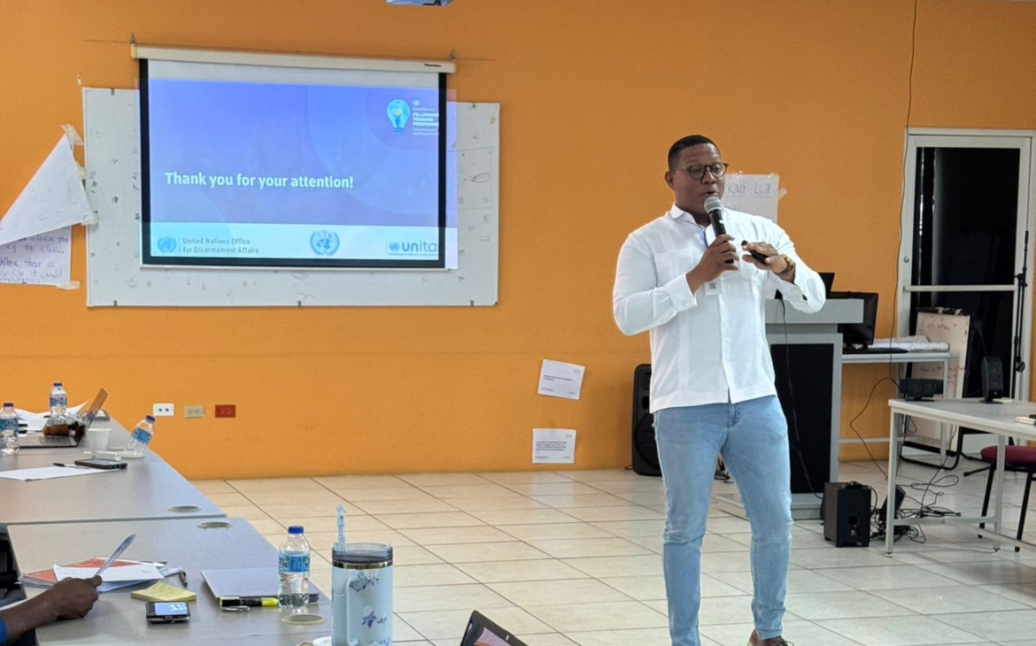 A participant delivers a presentation during the Fellowship Training Programme