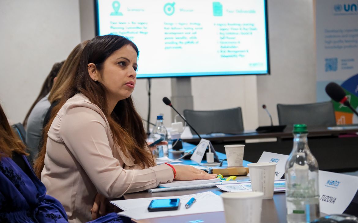 Participant listening during a session of the UNITAR Executive Diploma in Sports Diplomacy in Geneva.