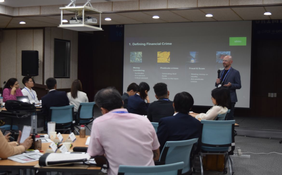 Expert leading a discussion on Defining Financial Crime at the workshop.
