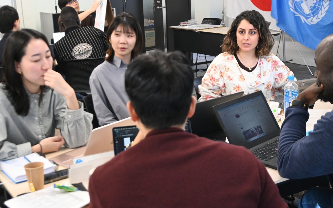 A small group of participants in a discussion during a session