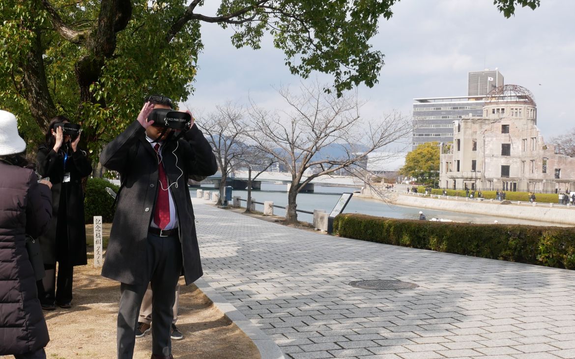 UNITAR training participant using a VR goggle at the Hiroshima Peace Memorial Museum