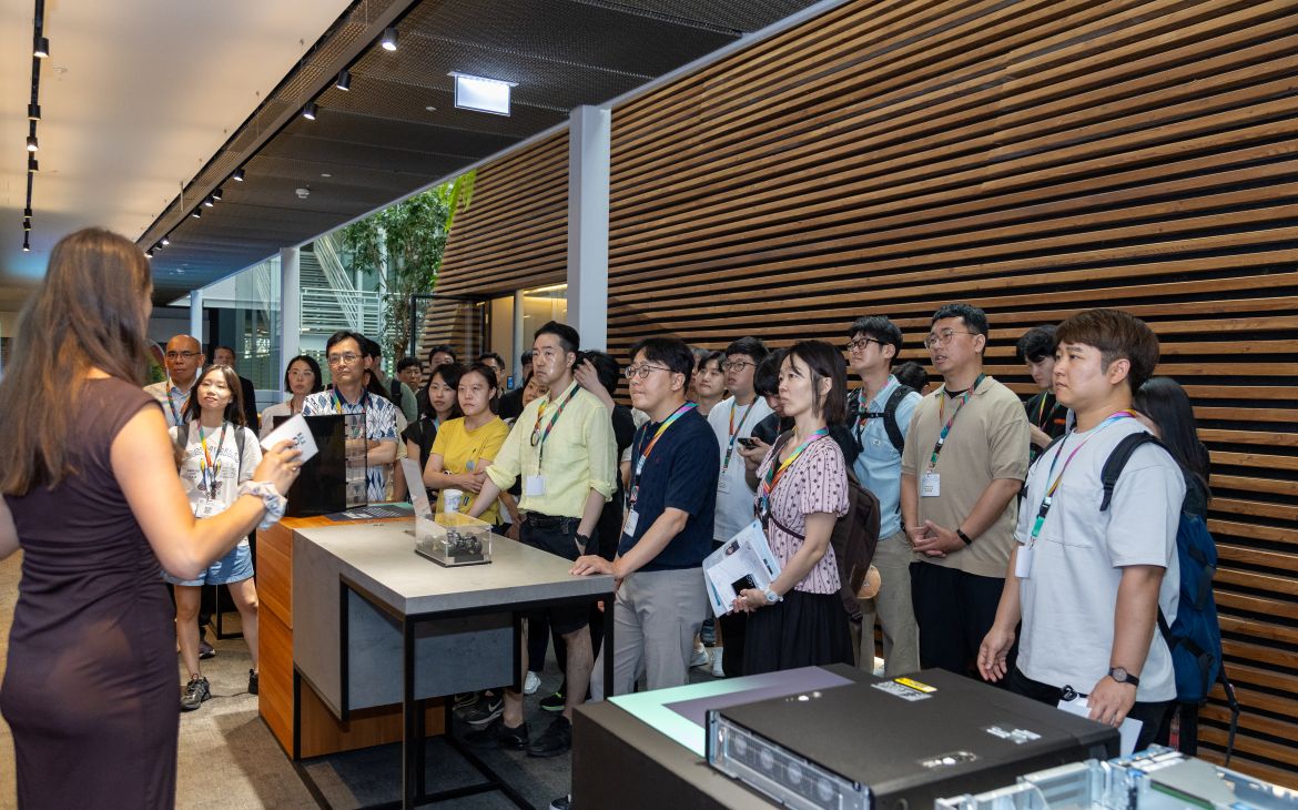 Participants listen to an expert during a showcase. 