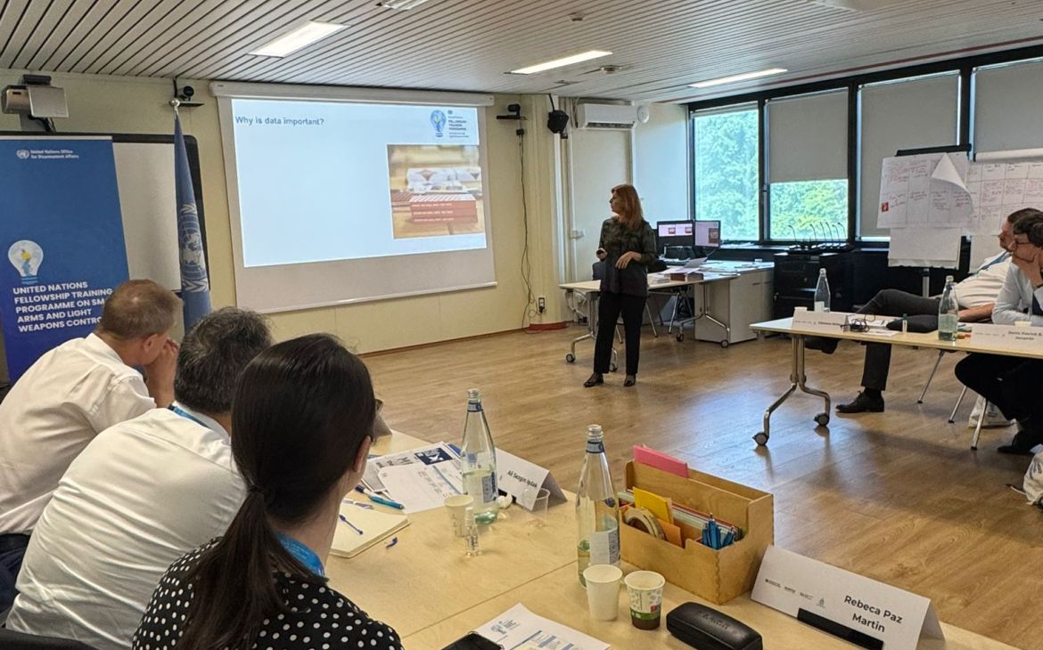 Trainer presenting to participants with a slide show presentation 