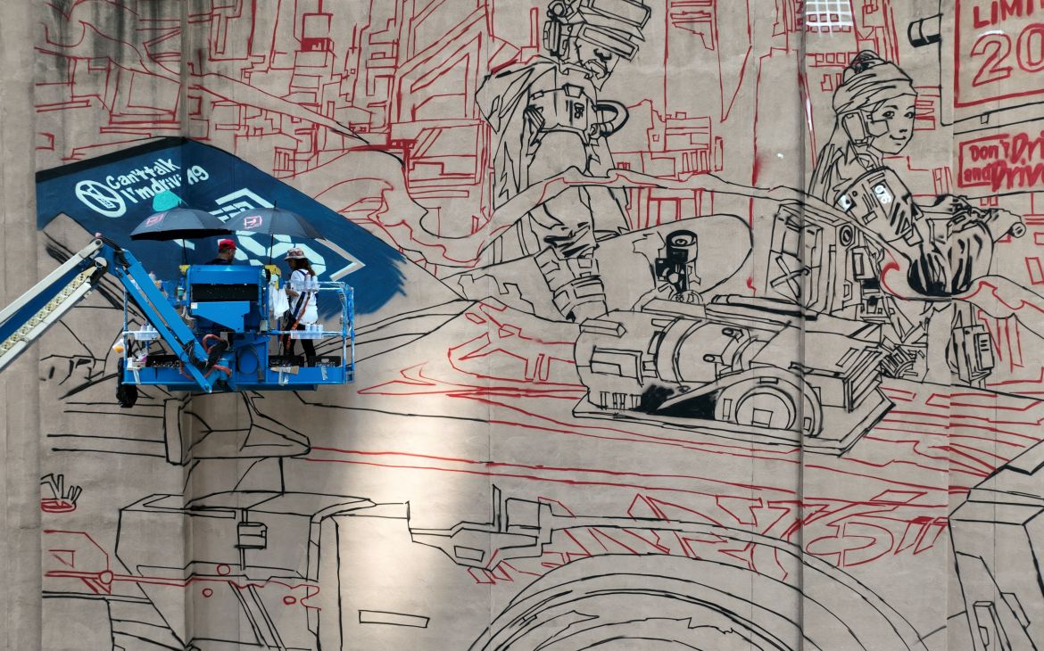 UNITAR's ‘Safe Driving is Cool’ mural in progress
