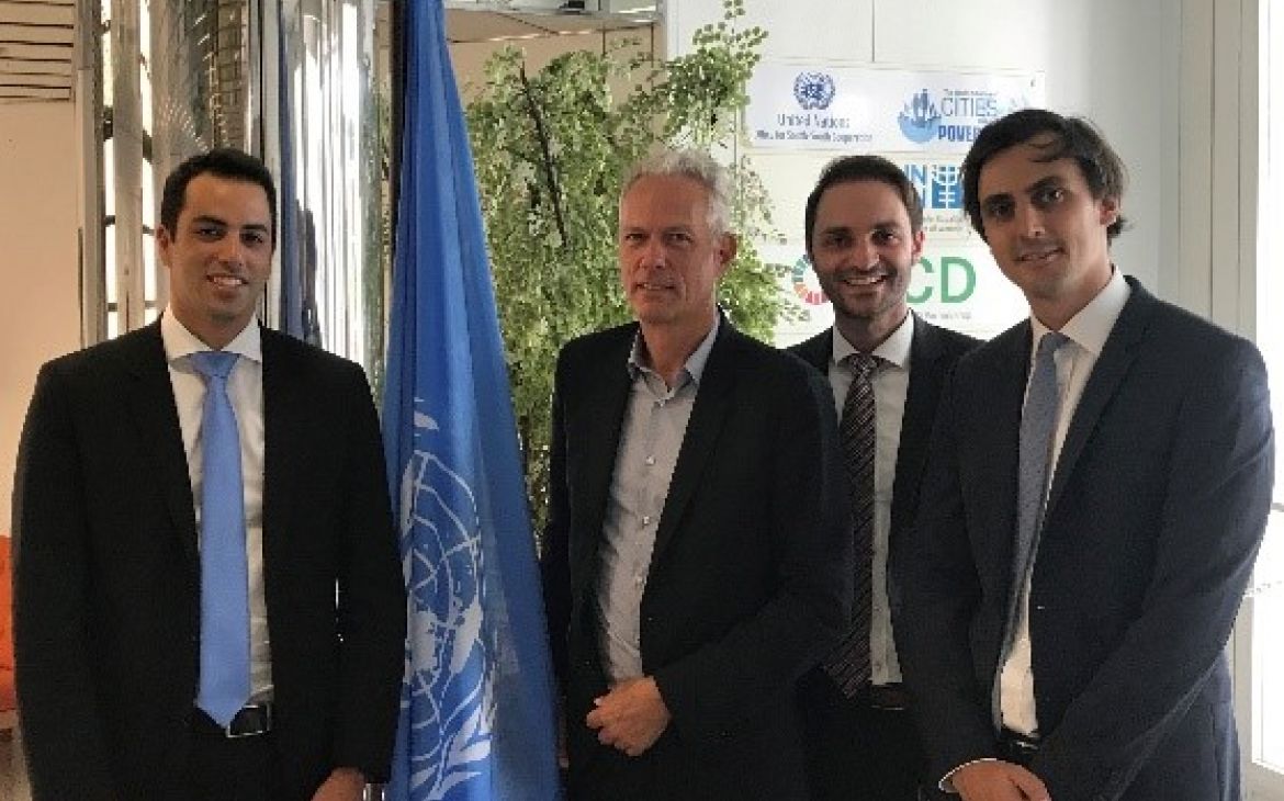 Simon-Kucher’s Geneva-based team Mehdi Damak (left), Thomas Hofmann (centre-right) and Florian Fleischer (right) with Brook Boyer of UNITAR (centre left) at the conclusion of the Final Presentation of Results Workshop.