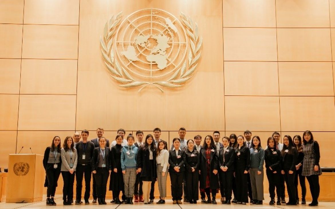Group photo at the Assembly Hall, the largest room in the Palais des Nations
