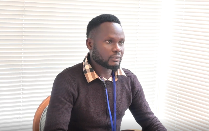 John Ladu Simon Jacob doing interview.