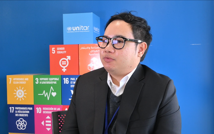 Aiyarat Kosakul doing interview with UNITAR.