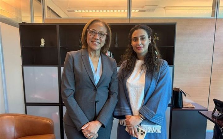 Photo of H.H. Princess Abeer S. Al Saud and Ms. Michelle Gyles-McDonnough, UN ASG and UNITAR Executive Director standing and facing the camera in a room