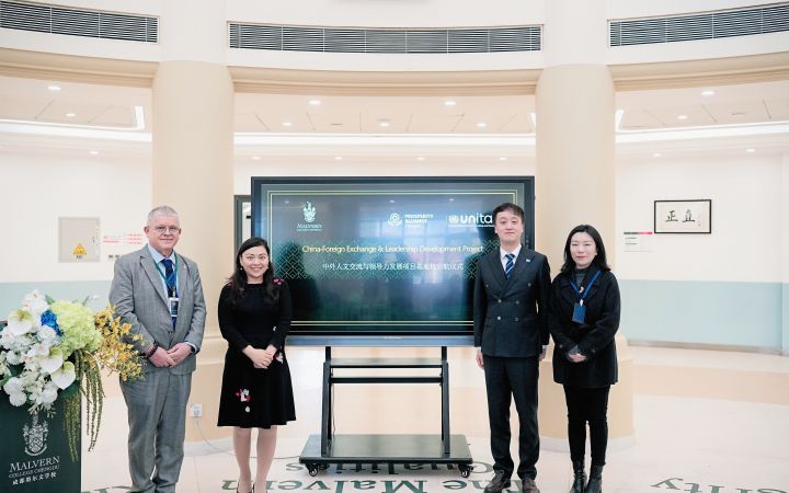 Business professional women and men takes a photo with a professional pose.