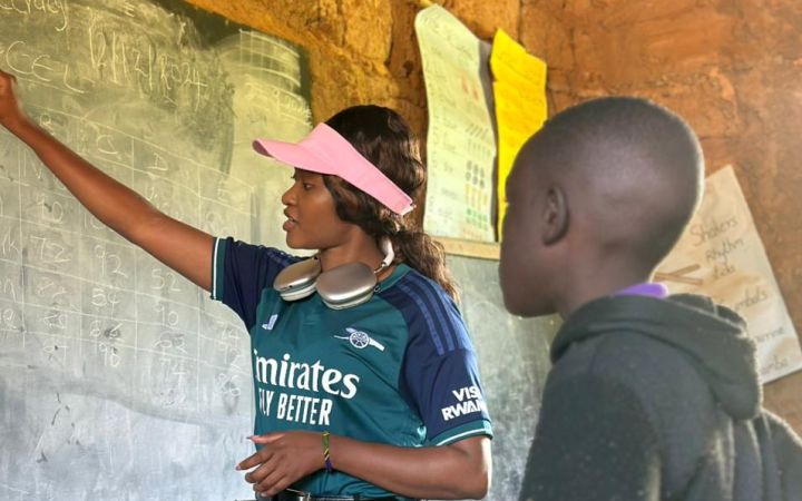 Betty Mwende doing digital literacy training in her village.