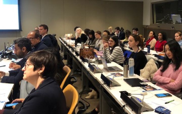 Attendees listening to Columbia Mediation Clinic's presenters