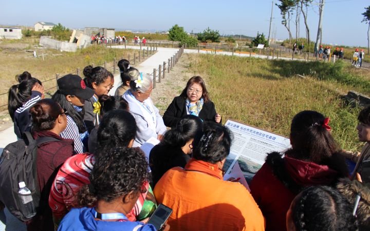 UNITAR staff lead the Disaster Risk Reduction Training Programme participants in a site visit