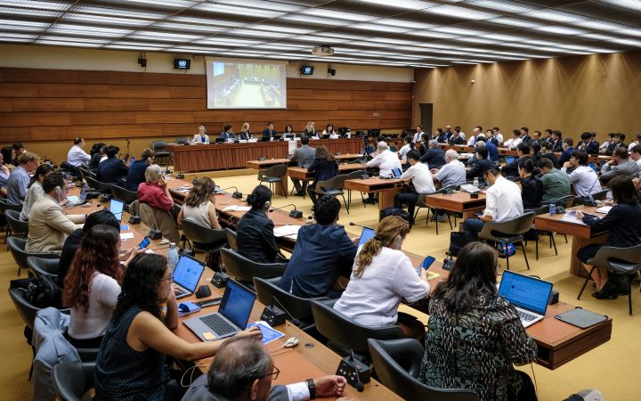 Wide-angle photo of the room during the panel discussion during the NPT PrepCom side-event