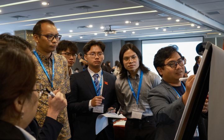 Participants from Leaders for a Free and Open Indo-Pacific: Sea and Human Security programme 2024 doing group work at Jakarta workshop.