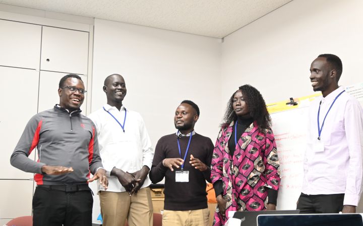 John Ladu Simon Jacob (person in the middle) working with other participants from the 2023 Great Ideas Space for South Sudan: Entrepreneurship and Innovation Training for Food Security programme