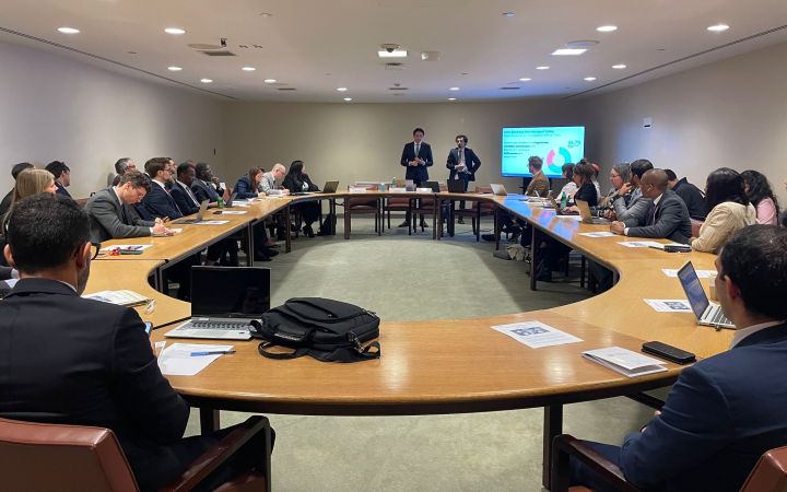 Participants seated around the room
