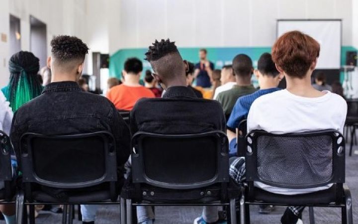 Photo of students attending a session