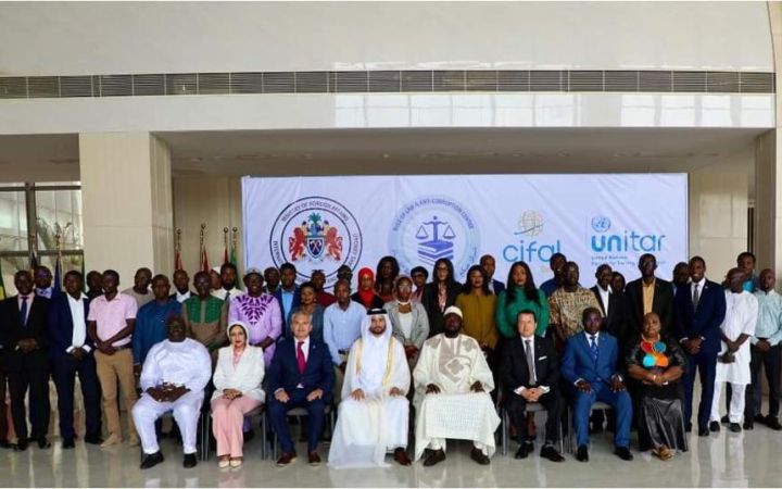 Participants, facilitators, and distinguished guests pose for a group photo during the Workshop on Cybercrime and Cybersecurity chaired by Dr. Mamadou Tangara.