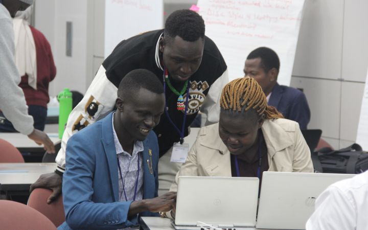 Participants doing group work in "Entrepreneurship and innovation trainings: South Sudan" Programme