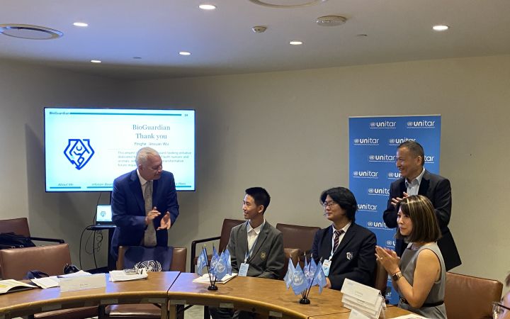 Head of UNITAR NYO Marco A. Suazo congratulating Fosun Foundation award recipients 