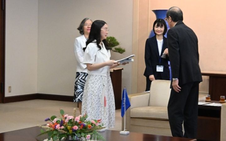 UNITAR Training Participant speaking to the Mayor of Hiroshima City during a courtesy visit