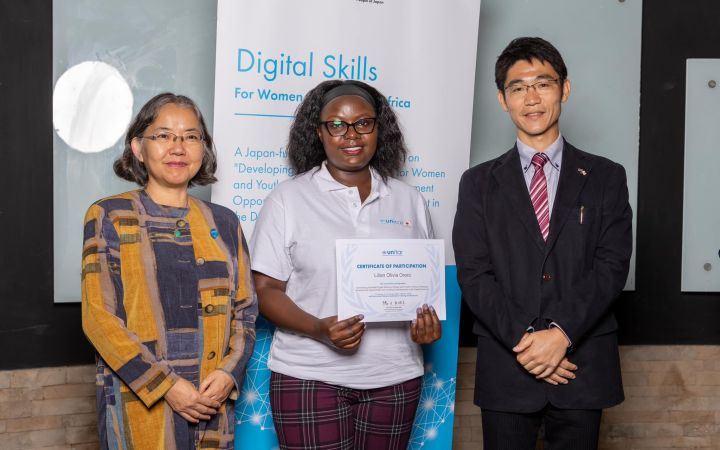 Lilian Olivia receiving certificate from Head of UNITAR Hiroshima Office Ms. Chisa Mikami and Mr. Fumihiro Uchikoshi, Second Secretary, Commercial and Trade Attaché at the Embassy of Japan in Kenya