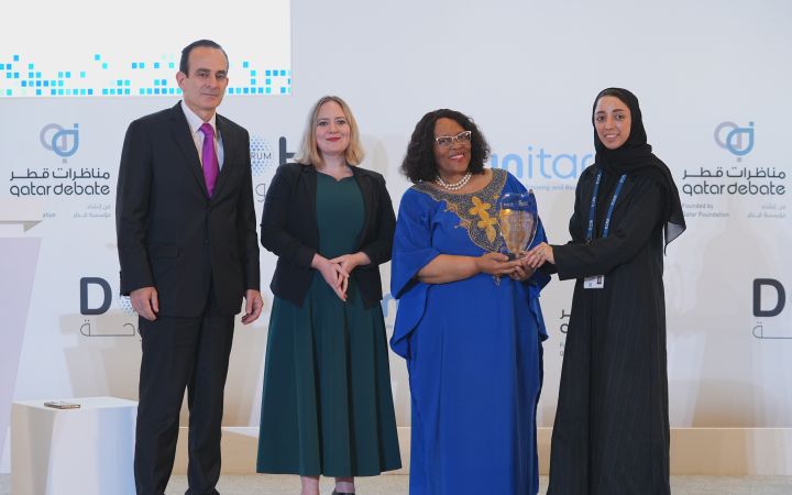 From left to right: Mr. Rabih El-Haddad, Ms. Sabrina Wollmann, Ms. Matsoso and H.E. Maha Al-Awadi, marking the formal recognition of Ms. Matsoso's achievement. 