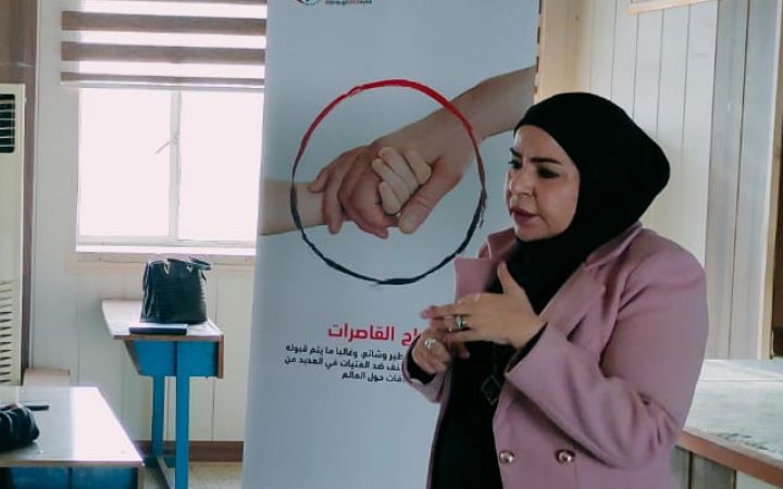 Alia Abbas training her staff. 
