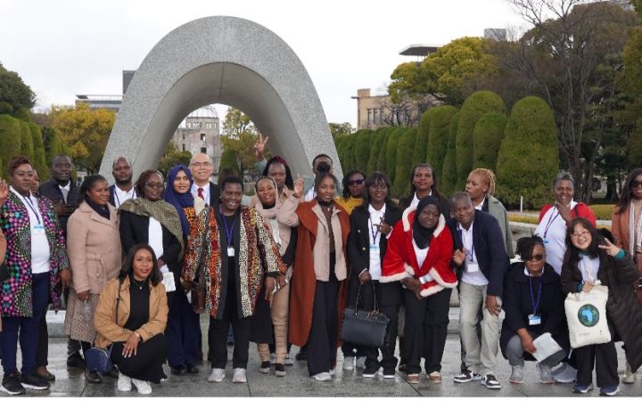 Participants visit the Memorial Cenotaph at the Peace Memorial Park of Hiroshima.