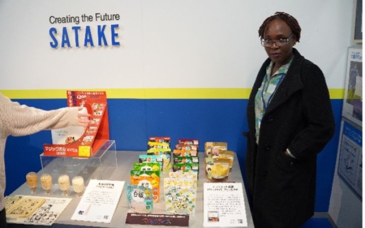 A participant attending the Satake Corporation field visit in Hiroshima, Japan.
