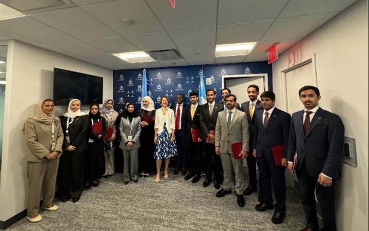 The Fellows gather for a photo at the Interpol Office