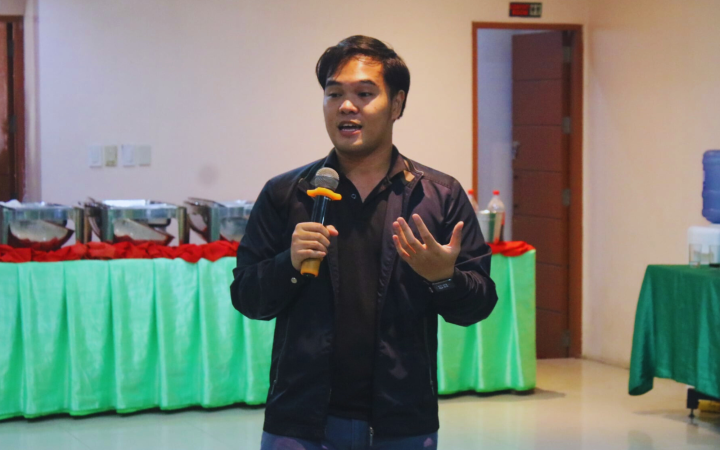 John giving lecture on Non-Violent Communication to the members of a youth organization