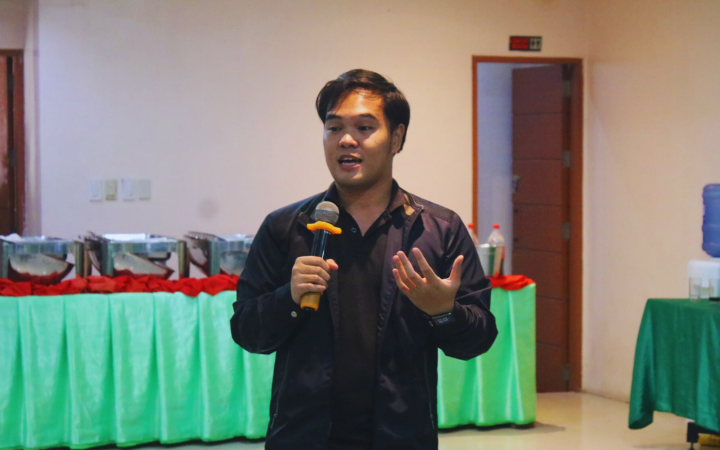 John giving lecture on Non-Violent Communication to the members of a youth organization