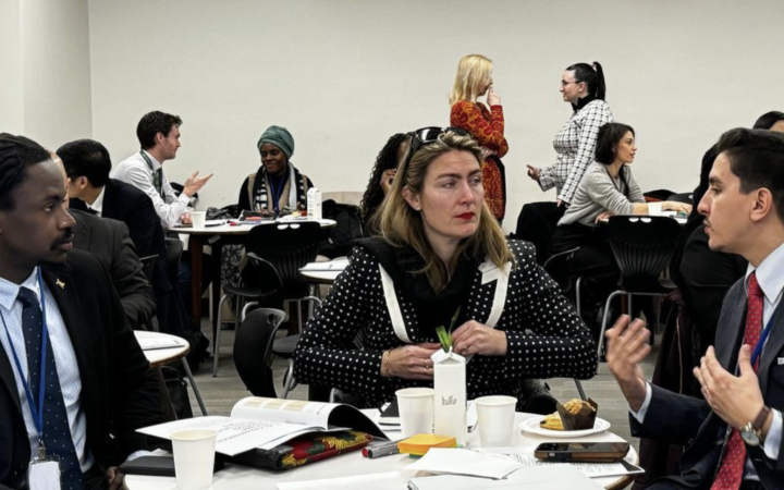 Three participants engage in scenario building exercises