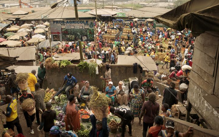 A market in the city of Douala, Cameroon. Douala has experienced increased flooding due to the impact of climate change. Photo: UN Women/Ryan Brown CC BY-NC-ND 2.0