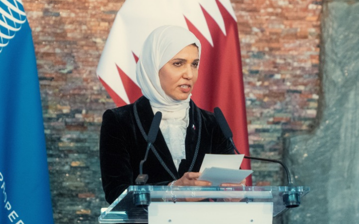 Dr. Hend Abdalrahman Al-Muftah, giving a speech during an event