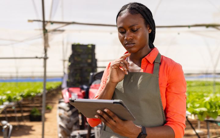 A farmer using a tablet