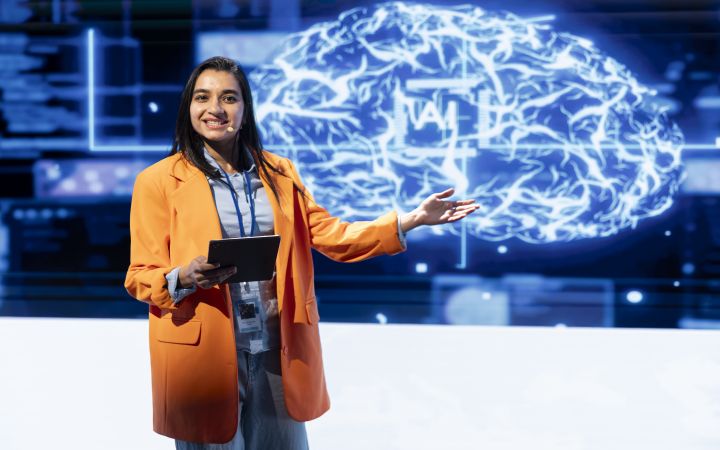 Presenter talking at an AI workshop.