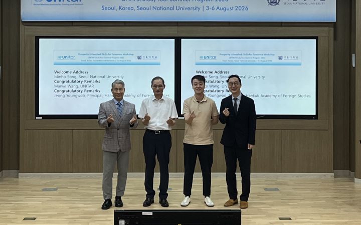 A group photo at the opening ceremony from left to right: Dr. Charlse Cho (Seoul National University), Mr. Jeong Youngwoo (Hankuk Academy of Foreign Studies), Mr. Manke Wang (UNITAR), and Mr. Song Minho (Seoul National University). 