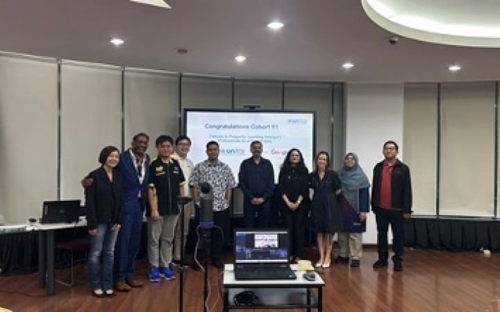 Group photo of Tan Yu Xian and Team
