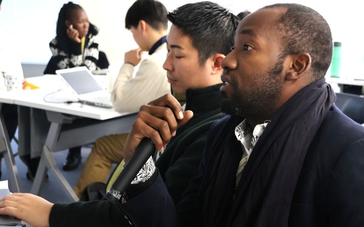 Jacques Dembele speaking at the Primary Course of the Program for Global Human Resource Development for Peacebuilding and Development discussion session