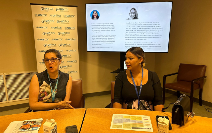 UNICEF officials give students an information session on the work of UNICEF