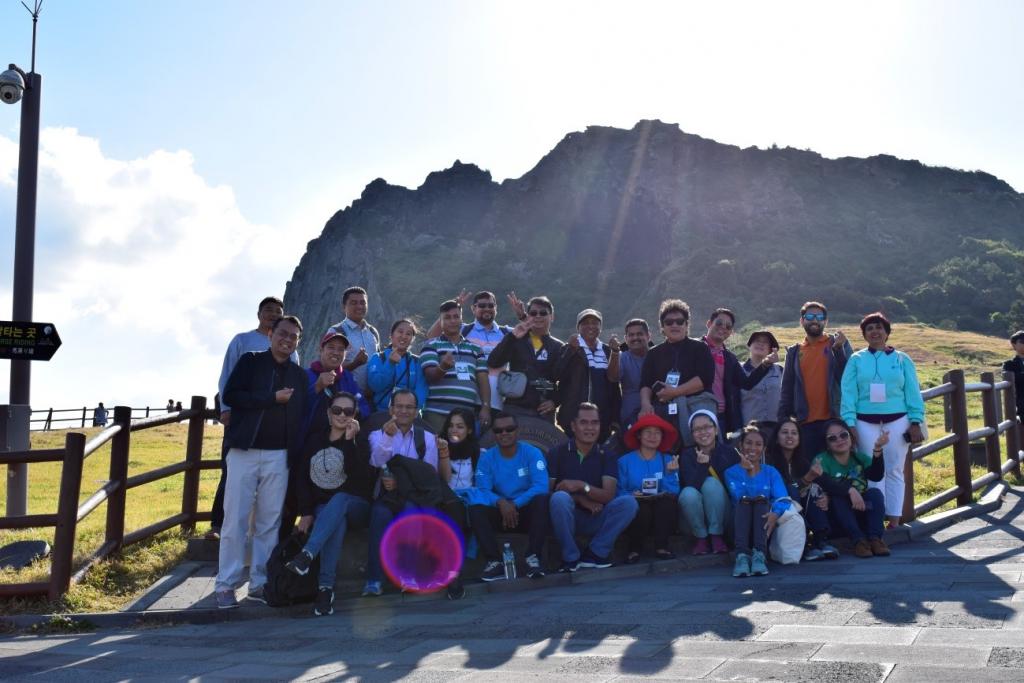 Participants at Sunrise Peak, one of UNESCO heritages worldwide