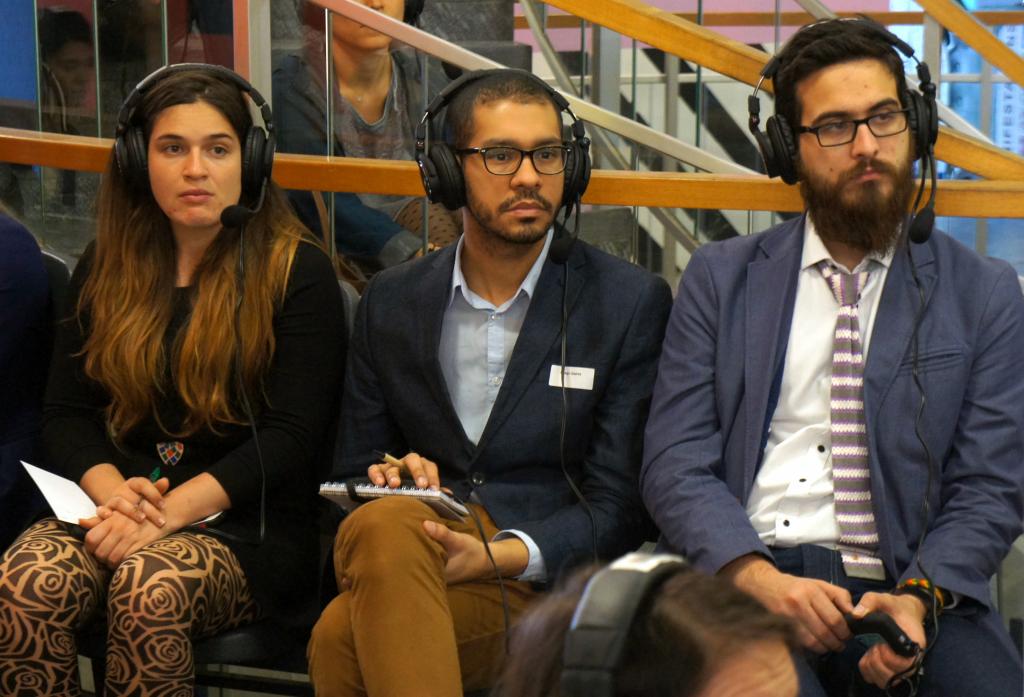 Participants focus on listening to the classroom via professional sound-proof headsets.