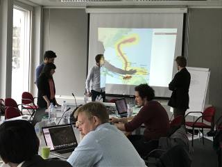 Students making a presentation of the assignment during the final course evaluation